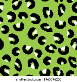 Abstract modern leopard seamless pattern. Animals trendy background. Green and black decorative vector stock illustration for print, card, postcard, fabric, textile. Modern ornament of stylized skin.