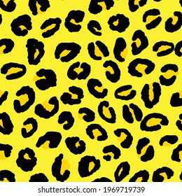 Abstract modern leopard seamless pattern. Animals trendy background. Black and yellow decorative vector illustration for print, card, postcard, fabric, textile. Modern ornament of stylized skin.