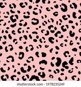 Abstract modern leopard seamless pattern. Animals trendy background. Black and pink decorative vector illustration for print, card, postcard, fabric, textile. Modern ornament of stylized skin.