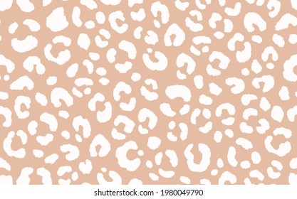 Abstract modern leopard seamless pattern. Animals trendy background. Beige decorative vector stock illustration for print, card, postcard, fabric, textile. Modern ornament of stylized skin.