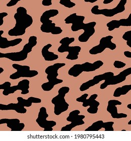 Abstract modern leopard seamless pattern. Animals trendy background. Beige and black decorative vector stock illustration for print, card, postcard, fabric, textile. Modern ornament of stylized skin.