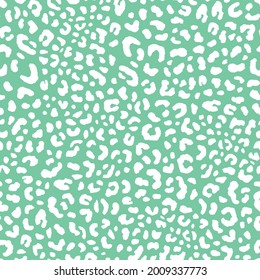 Abstract modern leopard seamless pattern. Animals trendy background. Green and white decorative vector stock illustration for print, card, postcard, fabric, textile. Modern ornament of stylized skin..
