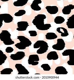 Abstract modern leopard seamless pattern. Animals trendy background. Beige and black decorative vector stock illustration for print, card, postcard, fabric, textile. Modern ornament of stylized skin.