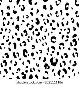 Abstract modern leopard seamless pattern. Animals trendy background. Black and white decorative vector illustration for print, card, postcard, fabric, textile. Modern ornament of stylized skin.