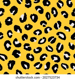 Abstract modern leopard seamless pattern. Animals trendy background. Orange and black decorative vector illustration for print, card, postcard, fabric, textile. Modern ornament of stylized skin.