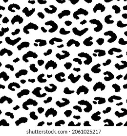 Abstract modern leopard seamless pattern. Animals trendy background. Black and white decorative vector illustration for print, card, postcard, fabric, textile. Modern ornament of stylized skin.
