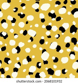 Abstract modern leopard seamless pattern. Animals trendy background. Yellow and black decorative vector stock illustration for print, card, postcard, fabric, textile. Modern ornament of stylized skin.