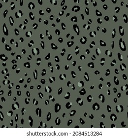 Abstract modern leopard seamless pattern. Animals trendy background. Green and black decorative vector stock illustration for print, card, postcard, fabric, textile. Modern ornament of stylized skin.