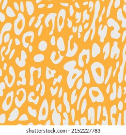 Abstract modern leopard seamless pattern. Animals trendy background. White and orange decorative vector stock illustration for print, card, postcard, fabric, textile. Modern ornament of stylized skin.
