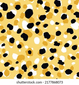 Abstract modern leopard seamless pattern. Animals trendy background. Beige and black decorative vector stock illustration for print, card, postcard, fabric, textile. Modern ornament of stylized skin.