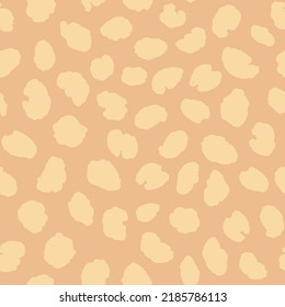 Abstract modern leopard seamless pattern. Animals trendy background. Beige and black decorative vector stock illustration for print, card, postcard, fabric, textile. Modern ornament of stylized skin.