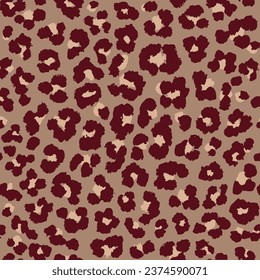 Abstract modern leopard seamless pattern. Animals trendy background. Red and beige decorative vector stock illustration for print, card, postcard, fabric, textile. Modern ornament of stylized skin.