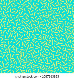 Abstract modern pop art vector seamless pattern with yellow forms in trendy memphis 80s-90s style on turquoise background.