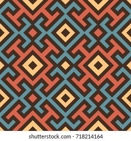 Abstract modern seamless pattern with decorative ornament of blue, red, orange, and brown shades
