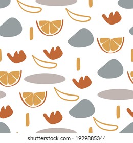 Abstract modern seamless pattern with slices of citrus orange fruit, grey, blue, orange and yellow color shapes 