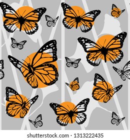 Abstract monarch butterfly pattern on a silver grey background seamless repeating pattern