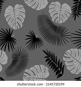 Abstract monochrome background from leaves. Beautiful seamless paper art illustration with tropical palm leaves background. Leaf pattern. Natural flower pattern.