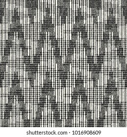 Abstract Monochrome Dashed Zigzag Motif Variegated Textured Background. Seamless Pattern.