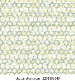 Resumen Monocromo Irregular Texturizado Motif. Patrón sin foco.Diseño Ikat sobre fondo verde amarillo.