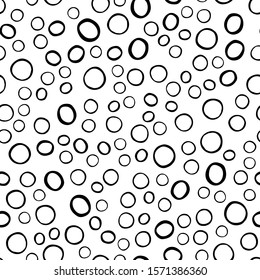 Abstract monochrome seamless pattern with circle round shapes elements on white background. Hand drawn simple design texture with chaotic shapes. Vector illustration