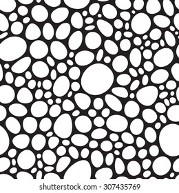 Abstract monochrome seamless pattern with white rounded shapes on black background