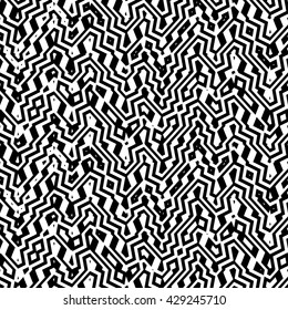 Abstract monochrome seamless vector pattern of complex tessellations.