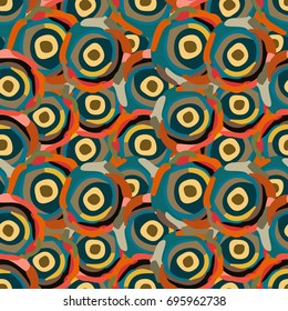 Abstract multicolored seamless pattern out of circular geometric shapes. Bright colors.