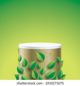 An abstract natural scene with a wooden column covered with green leaves. Oval form aesthetic display stand with a white cover desk, and free space for an object, product, or text placement.