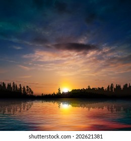 abstract nature background with forest lake dark clouds and sunset