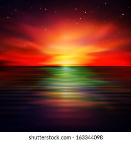 abstract nature background with ocean and red sunrise