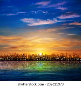 abstract nature background with panorama of city clouds and golden sunset