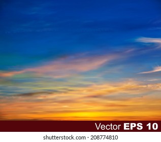 abstract nature blue background with golden sunset and clouds