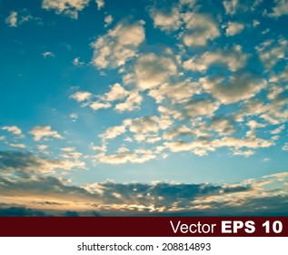 abstract nature blue background with sunset and white clouds