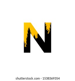Abstract Nature Letter N logo icon design concept  black tree on yellow glow moon.