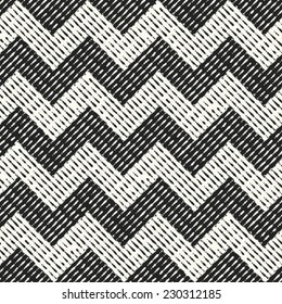 Abstract  noisy stroke chevron textured background.  Seamless pattern. Vector.