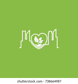 Abstract office building on green leaf in the love shape icon logo.