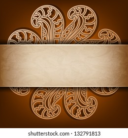 Abstract openwork flower on a brown background