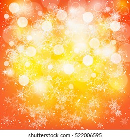 Abstract orange background with bokeh and snowflakes
