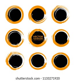 Abstract orange and black round textured smears set isolated on a white background