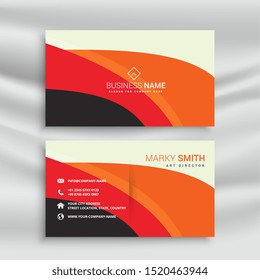 abstract orange color business card design template. Information in the card is fake and for display only