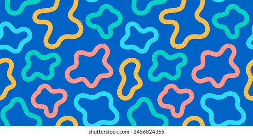 Abstract organic blob shape lines seamless pattern. Summer party trendy cow or giraffe skin spots on a bright blue background. Gender neutral fun design for kids with organic fun doodle shapes.