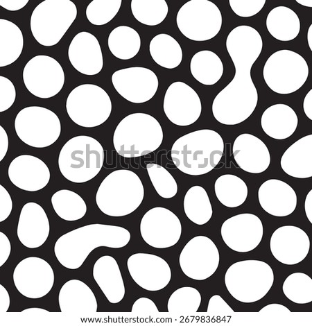 Abstract, organic pattern of irregular white shapes on a black background, resembling cells, bubbles, or organic growth, creating a visually dynamic and textured composition.