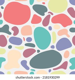 Abstract organic random shapes pebble stone pastel color seamless pattern on white background. Vector illustration