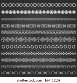 Abstract ornamental dividers set on chalkboard background. 