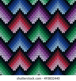 Abstract ornamental knitting seamless vector pattern as a knitted fabric texture in various hues of blue, violet, green and pink colors
