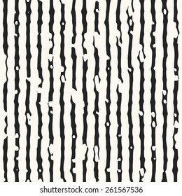 Abstract ornate damaged irregular striped background. Seamless pattern. Vector.