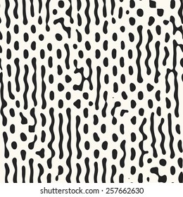 Abstract ornate irregular stroke spotty background. Seamless pattern. Vector.