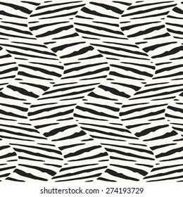 Abstract ornate irregular stroke wavy textured background. Seamless pattern.