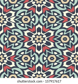 Abstract ornate kaleidoscopic floral seamless pattern. Vector.