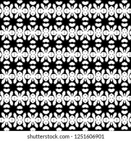 Abstract ornate psychedelic seamless pattern. Black and white grunge texture.